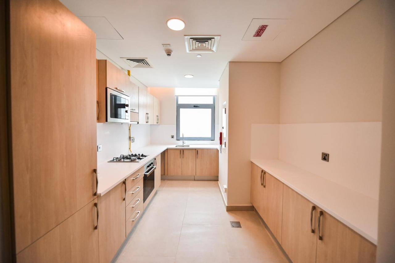 Waterfront Hotel Apartment Lusail Exterior photo A typical kitchen in a student flat