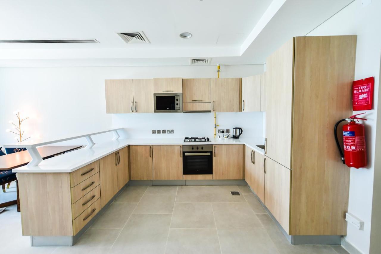 Waterfront Hotel Apartment Lusail Exterior photo A typical kitchen in a student residence hall